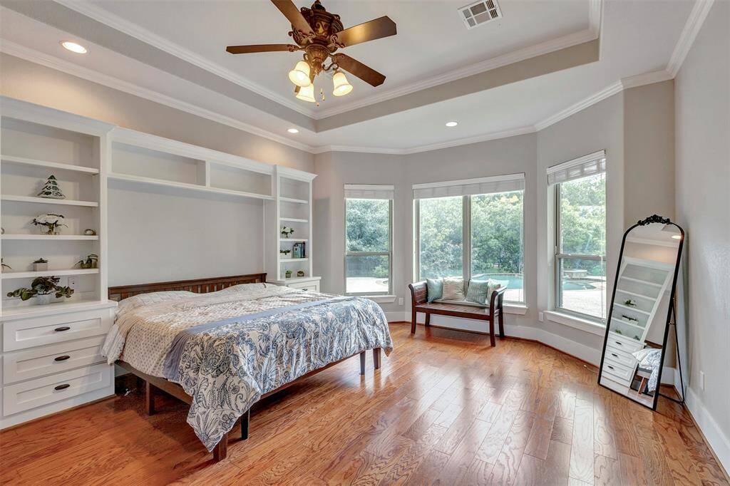 Primary bedroom with a nice view to the pool