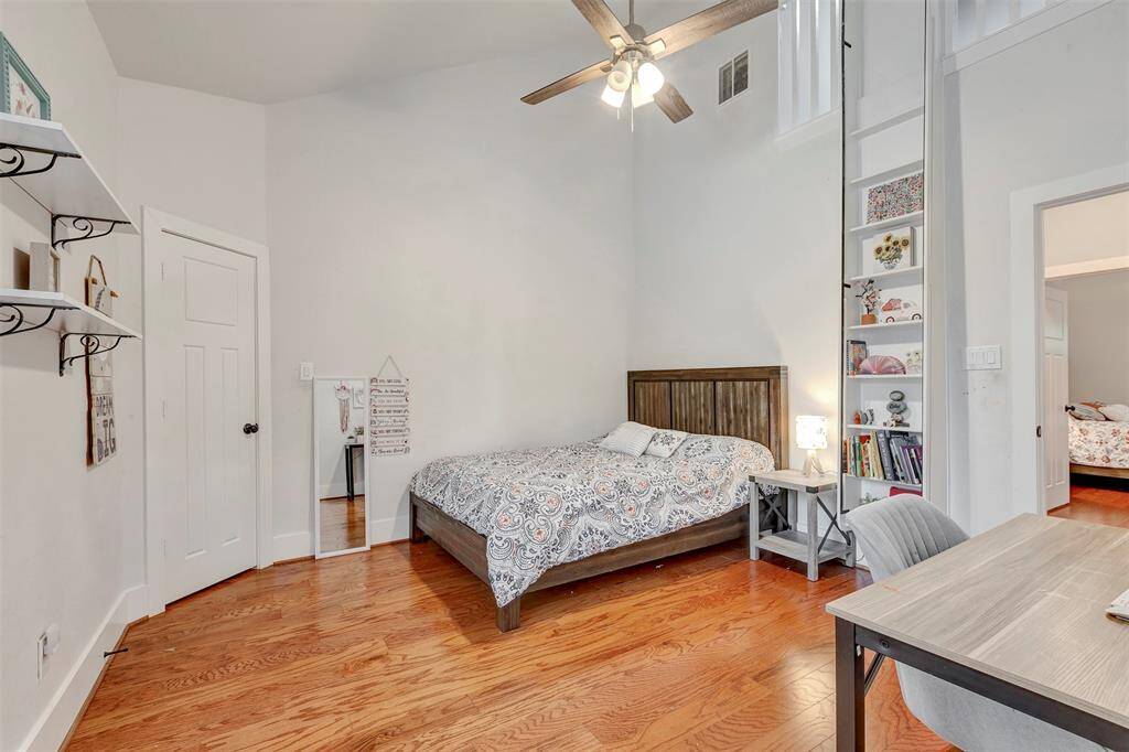 Guest Bedroom 3 with stairs up to a cozy loft area