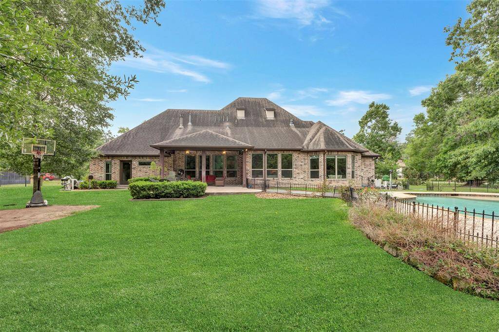 The home is located on over one acre of land.