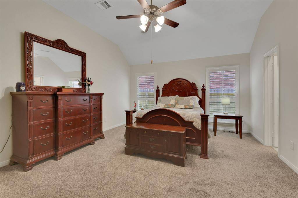 Primary ensuite with a large walk-in closet