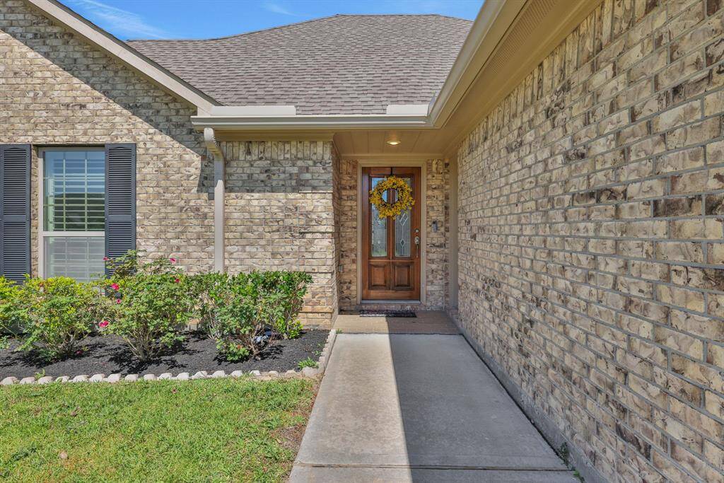 Come on in - Garage door is to the right of the front door for added convenience and more space inside.