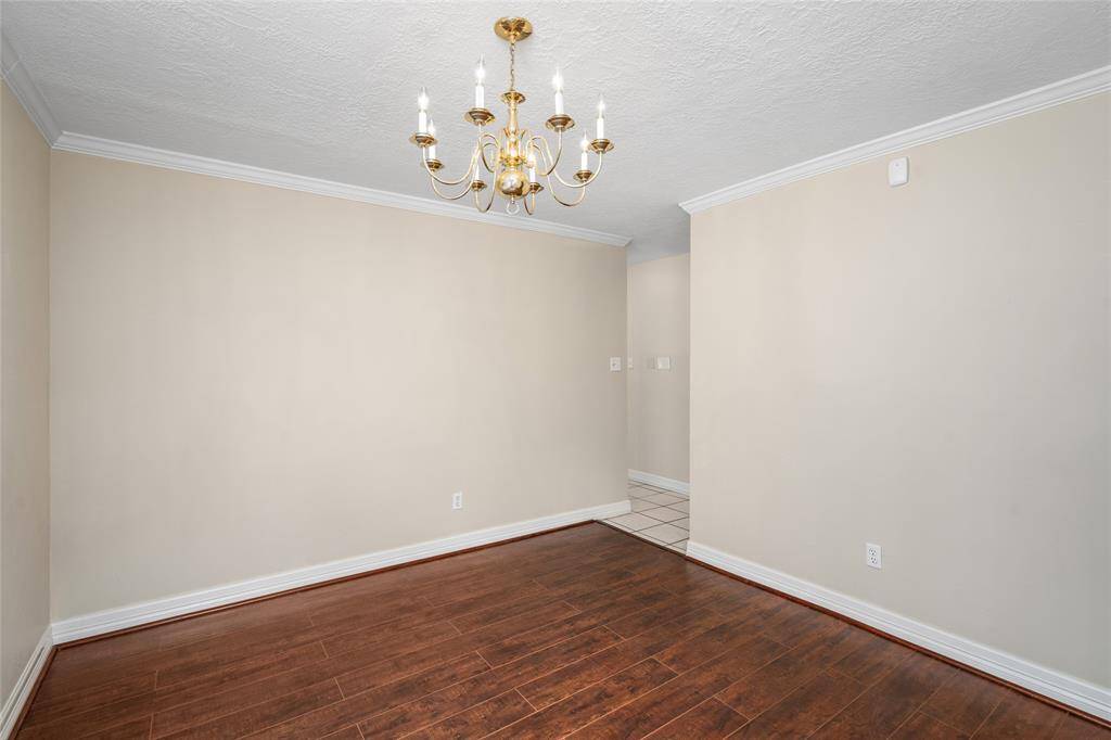 Alternate view of the formal dining room.