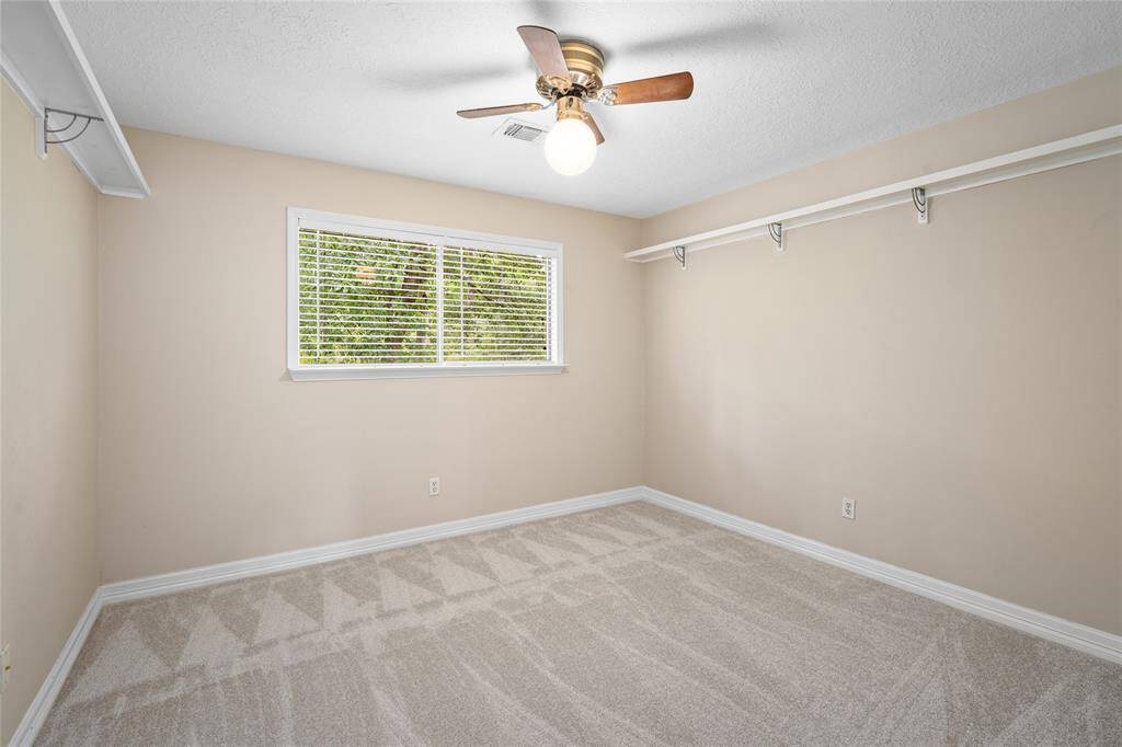 2 of 2 secondary bedrooms over looking the rear lawn with new carpert.