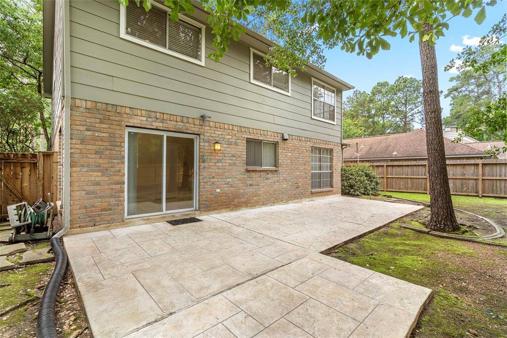 The rear terrace has been expanded and provides ample space for entertaining.