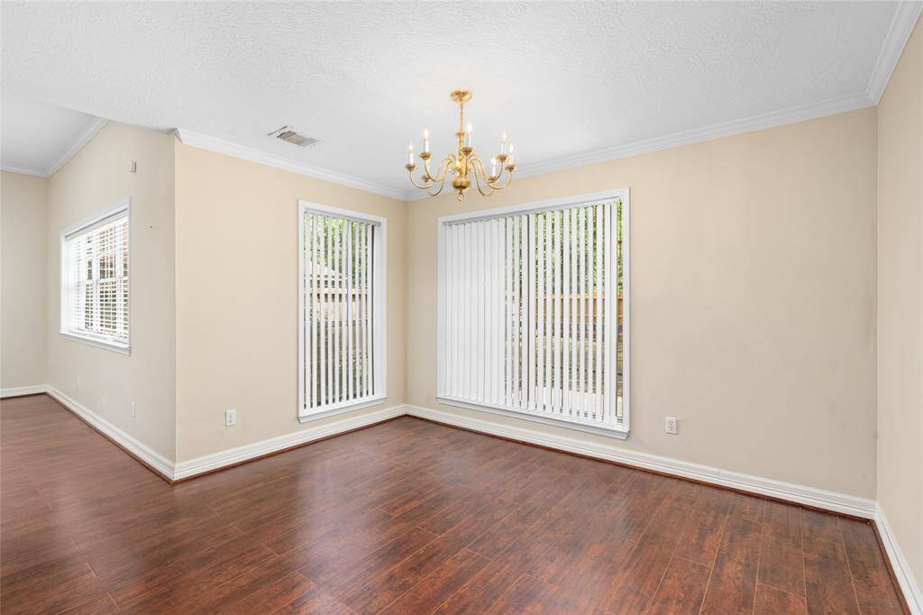 Between the living room and the kitchen is your formal dining room.