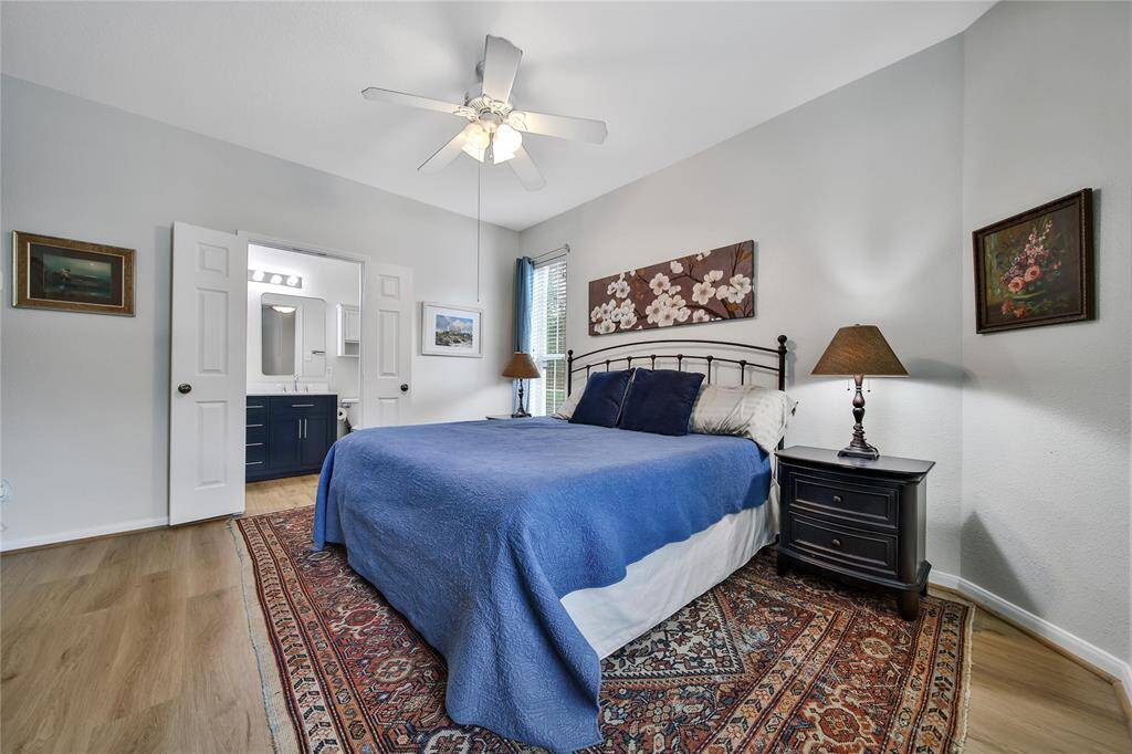 Ample light and double doors leading to the ensuite bath.