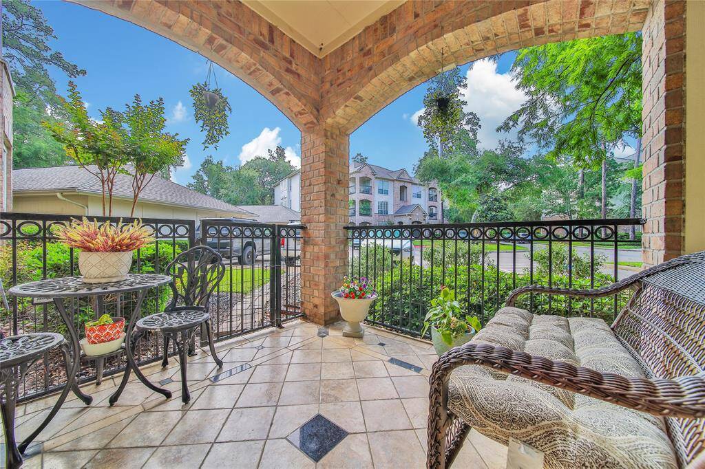 Lovely covered patio for relaxing in a very quiet section of the condominium.