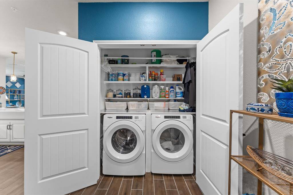 Private in-unit laundry space allows for added convenience and built-in storage.