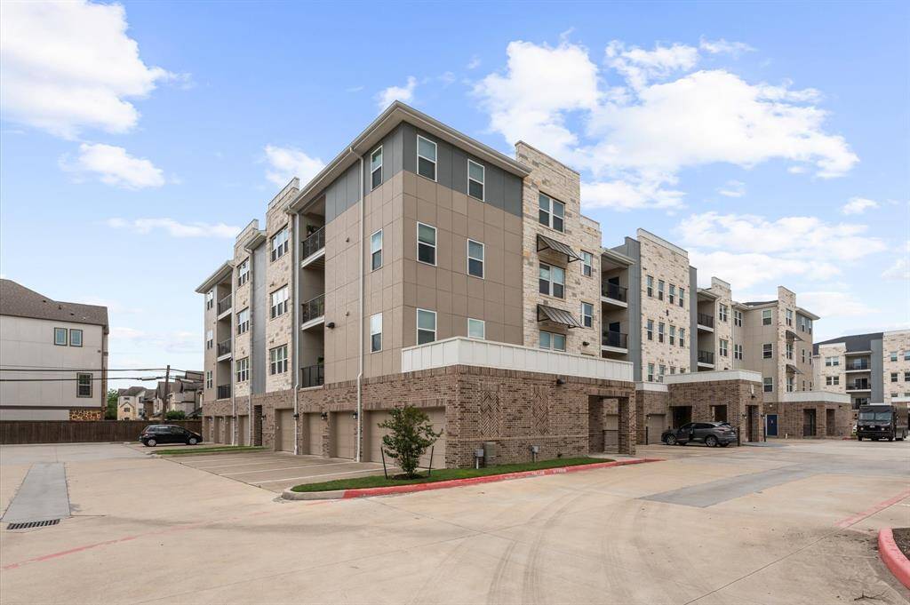 Modern construction with clean architectural lines, private garages, and ample guest parking in a gated community setting.