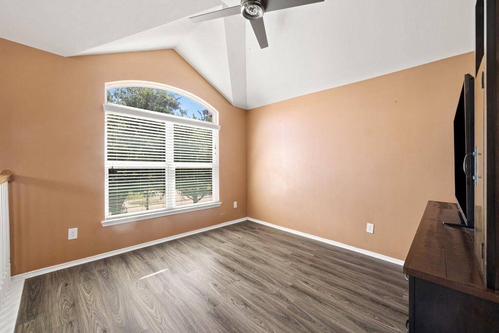 Cozy upstairs bonus space or lounge area.