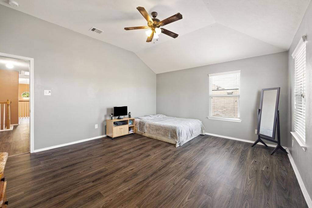 Oversized secondary bedroom with en-suite bath and walk in closet.