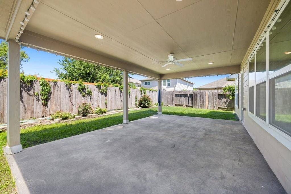 Extended space with ceiling fans and perfect to enjoy the outdoors year-round.