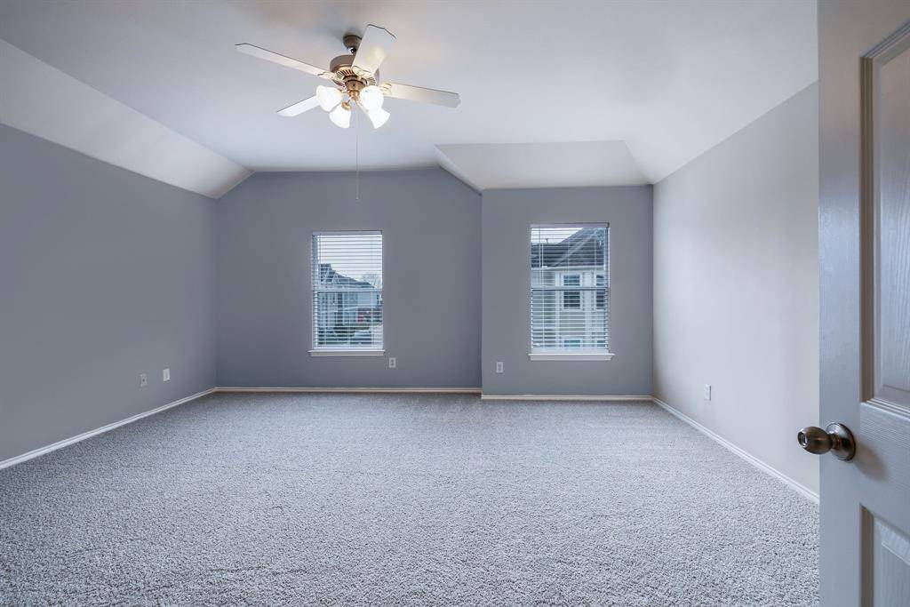 The primary bedroom features an ensuite bath and its own third story office!