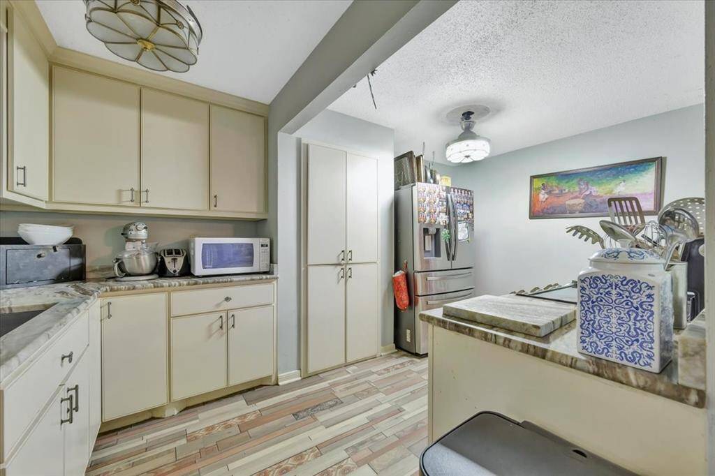 Bright kitchen space combined with a large dining room.