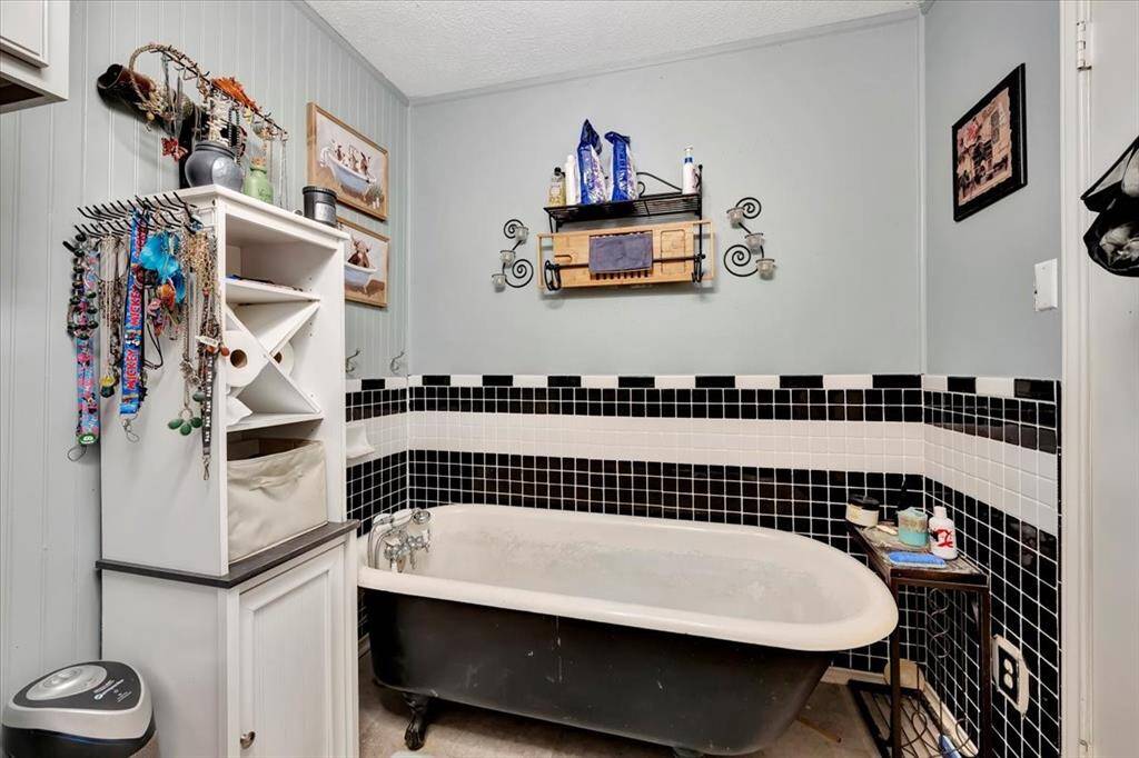 Primary bedroom with direct access to the porch for your morning coffee.