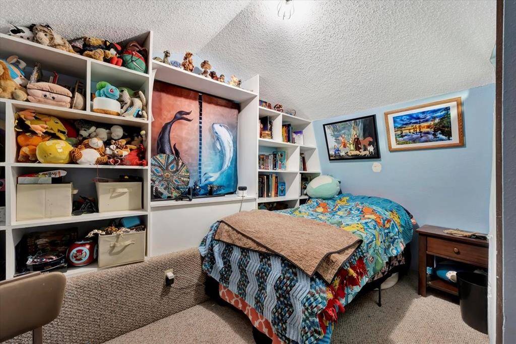 2 additional bedrooms and game room upstairs.