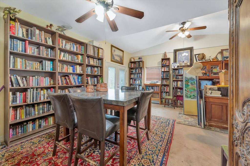 Pool house is currently being used as a large office space.