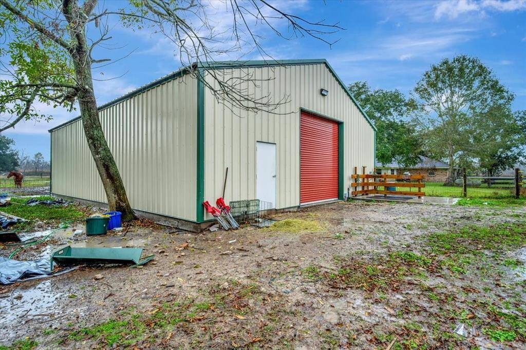Recently built 7 stall barn with a tack room, pull through entry and exit for you trailer.