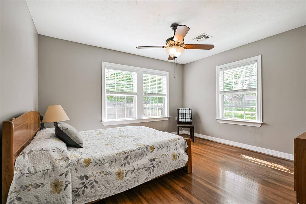 The second of the original 1938 bedrooms, this space continues the beautiful hardwood floors and includes a ceiling fan and ample closet space.