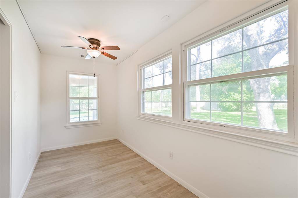 Tucked at the back of the addition, this flexible space is full of potential—perfect for a craft room, home gym, pet room, or whatever best fits your lifestyle. A cozy, private space flooded with light and ready to be customized!