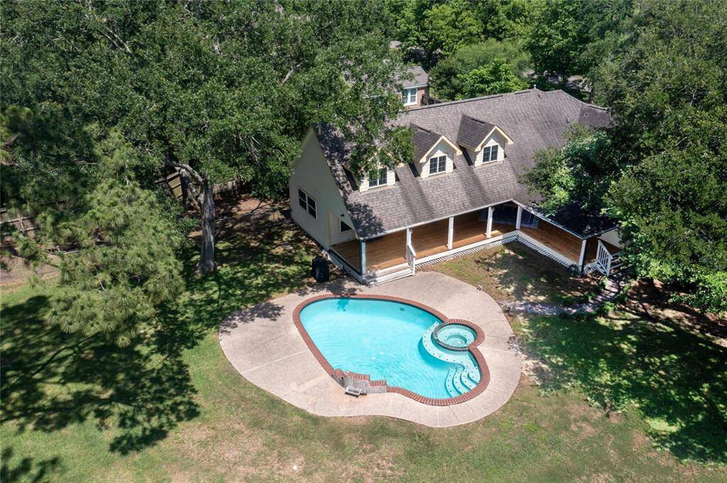 This view showcases the impressive 2016 two-story addition—an expansion that thoughtfully elevated this charming home with modern amenities and generous space. As a major bonus, all underground plumbing from the main home to the city connections was replaced, bringing peace of mind along with style and comfort.