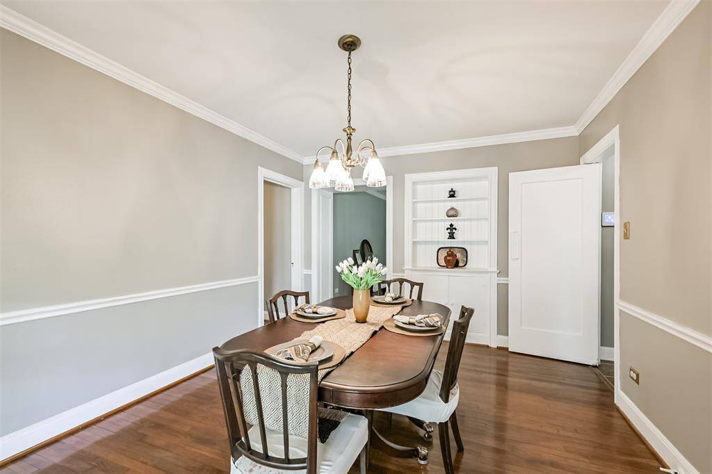 Tucked just off the main living space, the dining room includes access to a private upstairs suite—ideal for guests or a quiet retreat of your own.