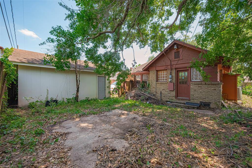 Backyard is fully fenced and has an oversized single garage