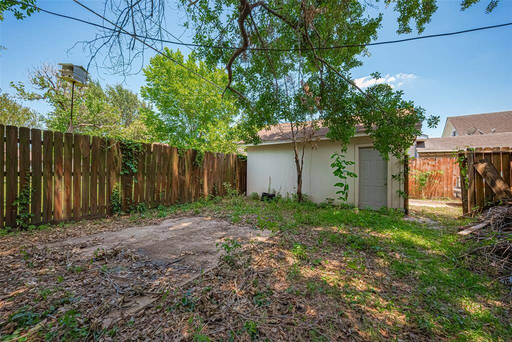 Concrete pad if you want to add a shed - Garage is in very good condition
