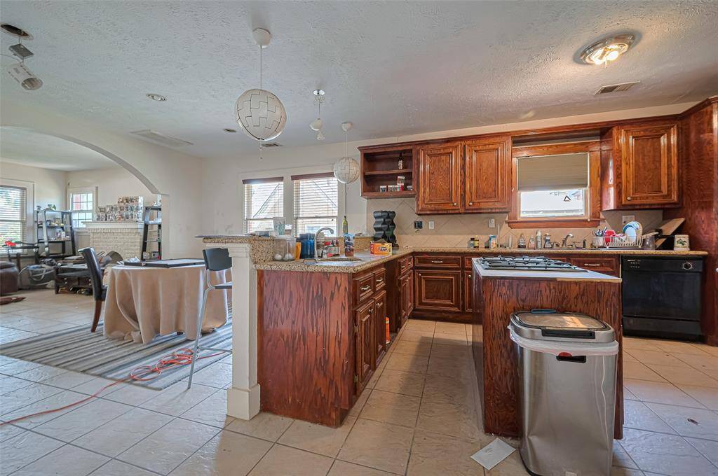 Kitchen is open to dining and living room