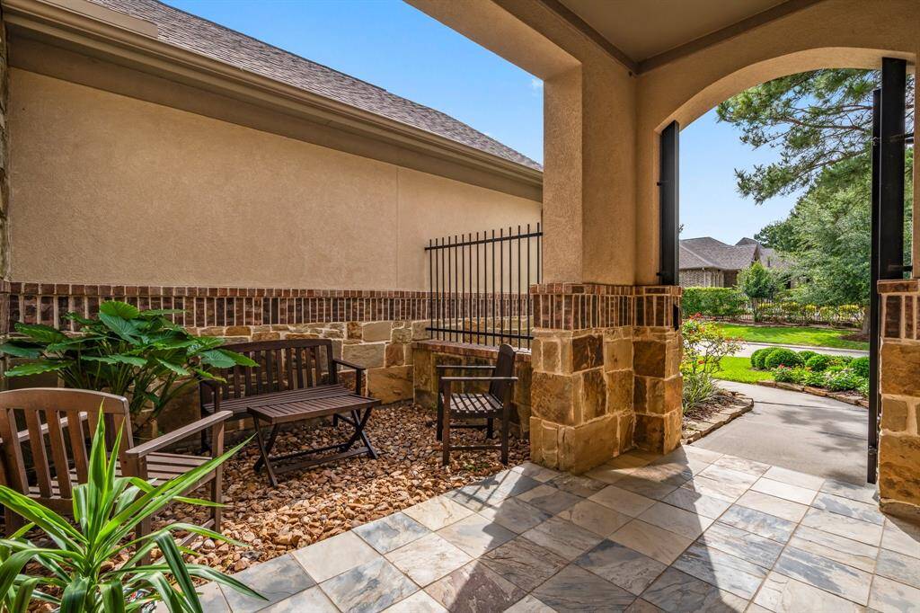 This inviting space offers the perfect setting for a bistro table and chairs, adding a touch of European flair and timeless sophistication to this exceptional residence.