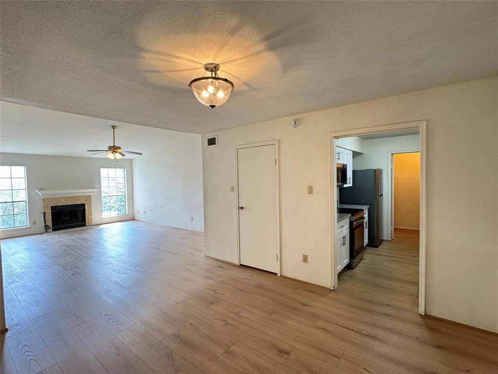 Dining room leads to kitchen, utility/storage closet on left