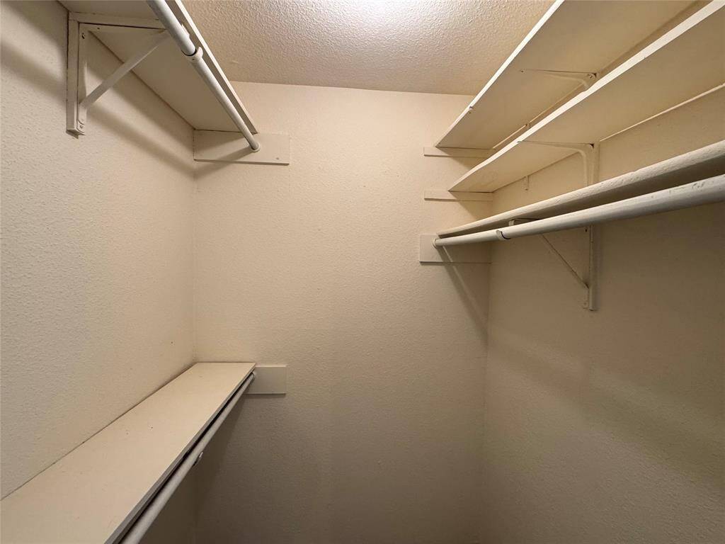 Secondary bathroom with NEW cabinets, countertops, and resurfaced shower