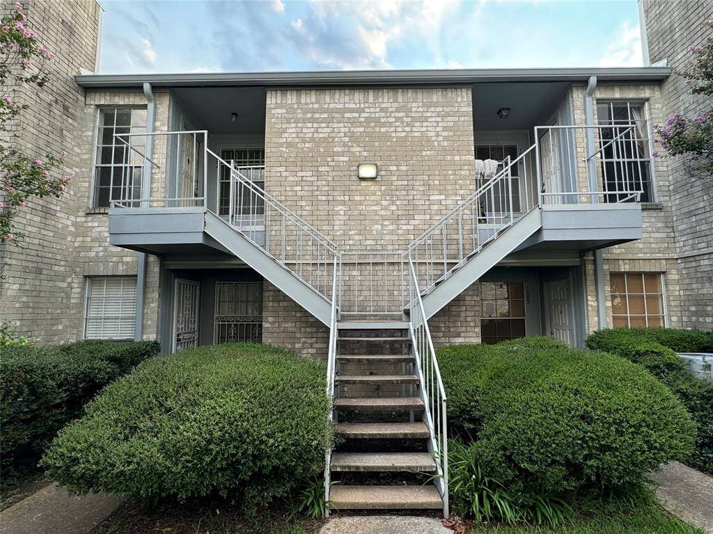 Unit is upstairs to the left