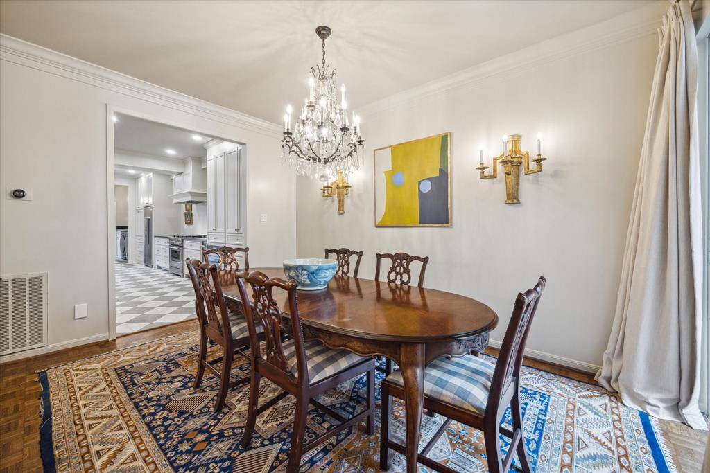 This view of the formal dining room shows its convenient placement by the kitchen.