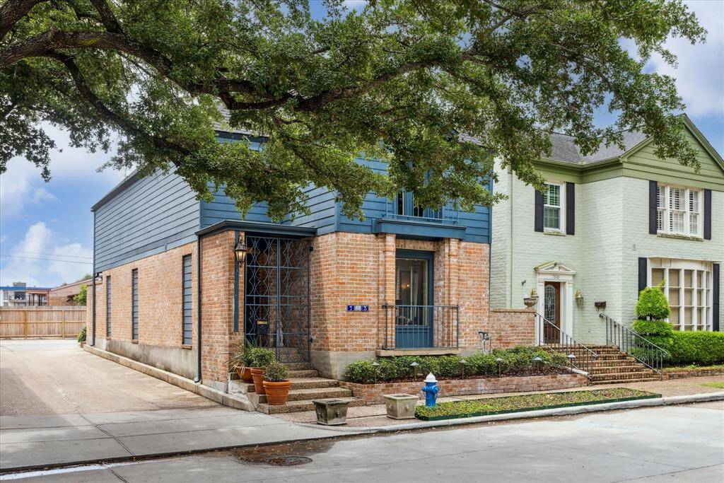 Unique to Hammersmith, this home enjoys alley access to a private 2 car garage, and boasts multiple sun-filled outdoor spaces including a spacious back courtyard, side patio, plus balconies at each of the bedrooms.
