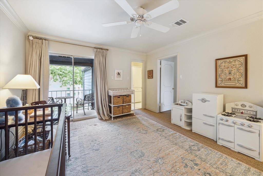 Both of the generously sized secondary bedrooms enjoy balconies.  This one also has two closets.