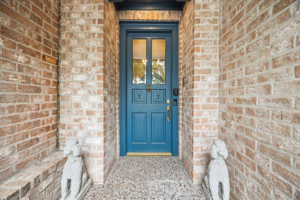 An attractive wrought iron front gate opens to a pleasing covered entry, welcoming your guests. One highlighted seller upgrade of this meticulously maintained and remodeled home is the whole house re-piping with PEX pipes.