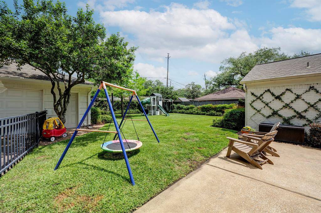 Large, fenced yard with plenty of space for play or pets.