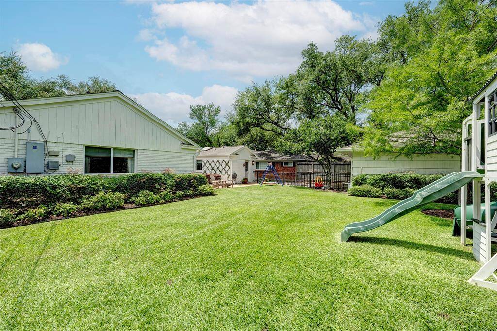 Backyard offers plenty of room to add a garden or expand your outdoor living space.