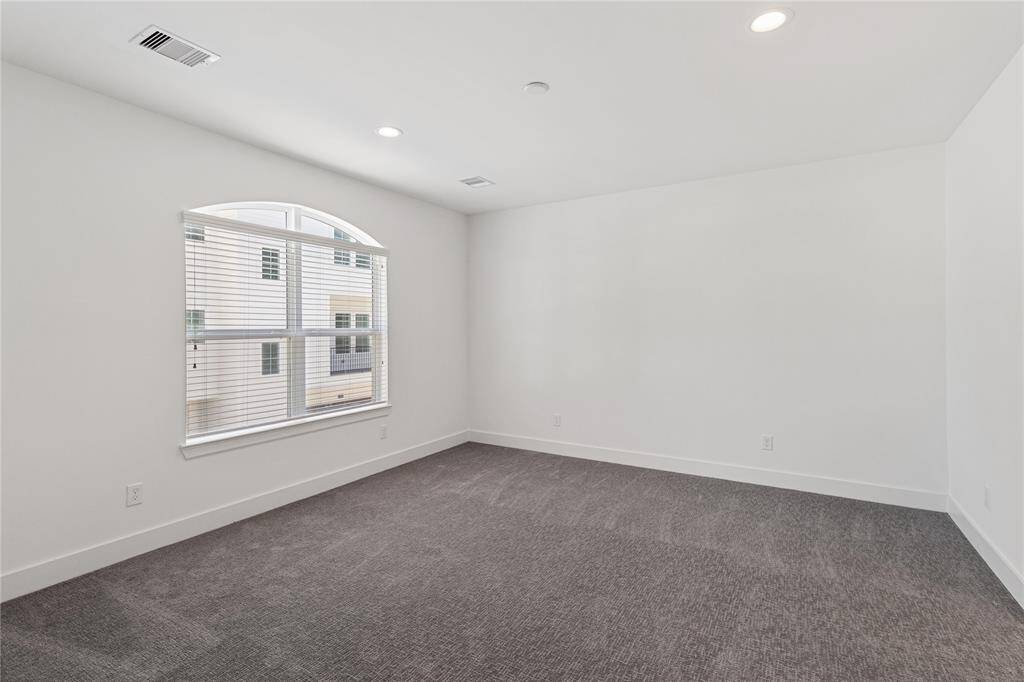 Spacious primary bedroom.