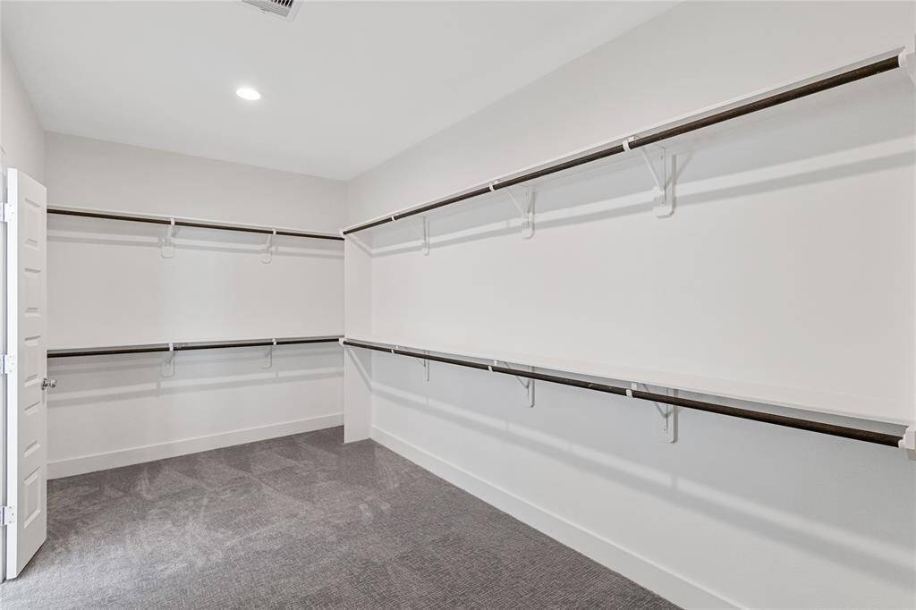 Primary bedroom HUGE closet space!