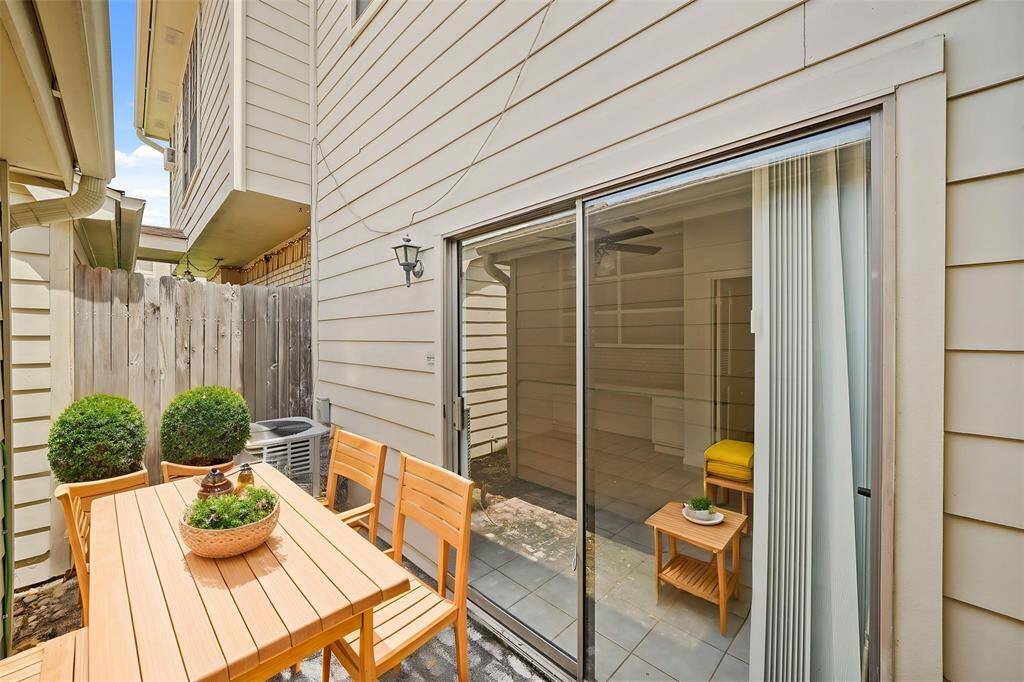 With a little TLC, you can transform the outdoor area into a charming patio retreat—perfect for relaxing or enjoying your morning coffee. - virtually staged
