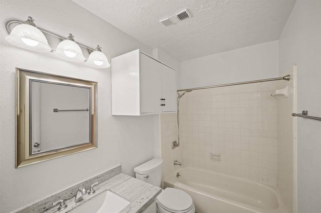 The secondary bathroom is stylishly appointed and thoughtfully designed for comfort and convenience.