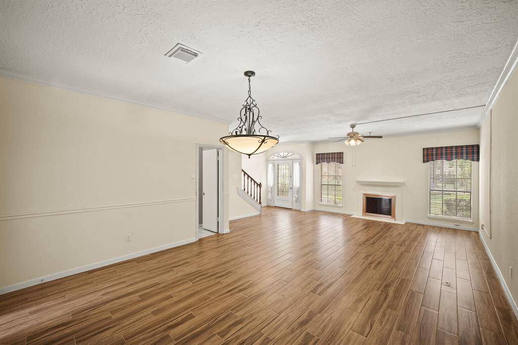 This is open-concept living at its best—seamlessly blending the living, dining, and kitchen areas to create a spacious, inviting atmosphere perfect for both everyday comfort and entertaining.