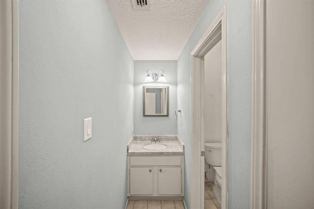 The downstairs half bath for added convenience.