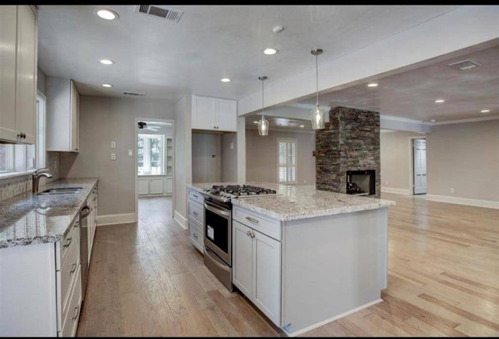 Kitchen opens to the dining, living room