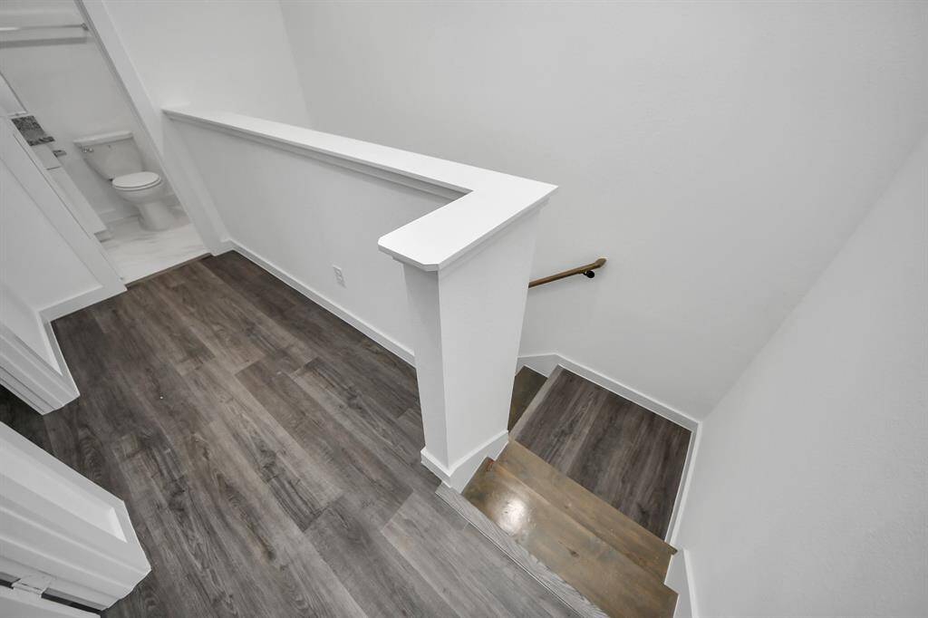 The staircase leads to the second floor.