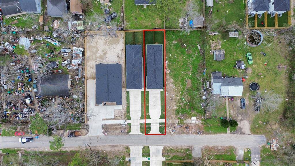 This duplex sits on a lot with a side yard and back yard.