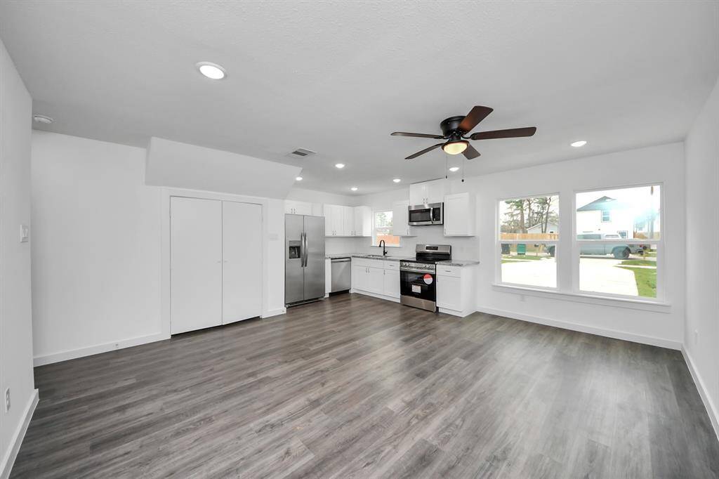 Upon entering is the spacious living room.