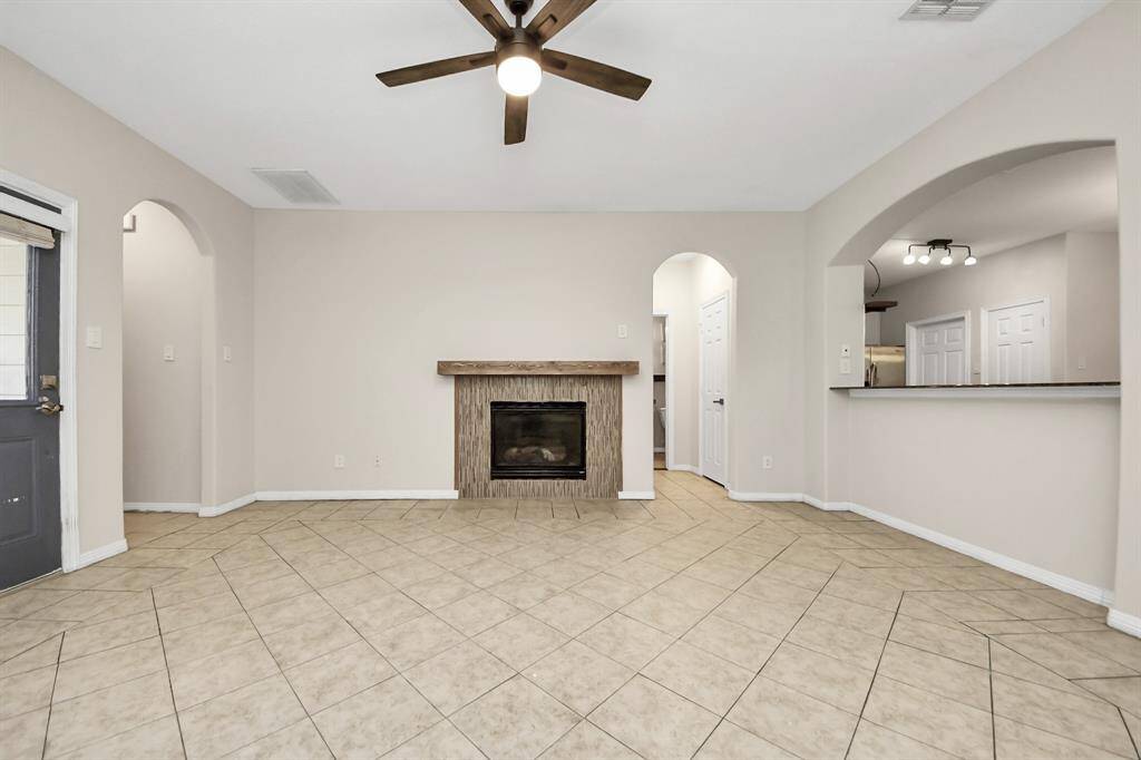 Cozy fireplace in the living area, creating a warm and inviting focal point.